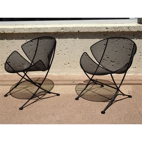 This was the metal that blacksmiths used to before the turn of the eighteenth century. Salterini "Slice' Wrought Iron Chairs - Pair | Chairish