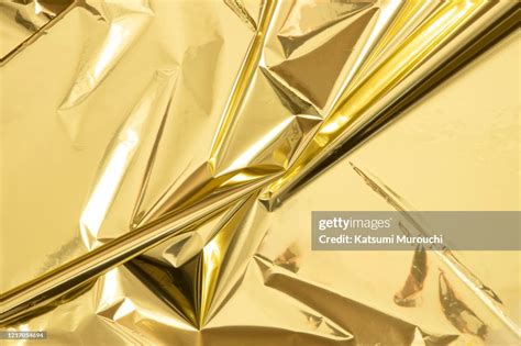 Metallic Gold Mylar Paper Texture Background High Res Stock Photo