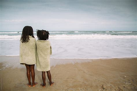 View Two Black Girls In Towels By The Beach By Stocksy Contributor