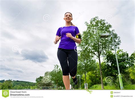 Sports Outdoor Young Woman Running In Park Stock Image