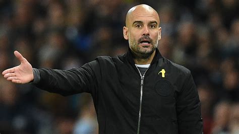 Why Does Pep Guardiola Wear A Yellow Ribbon The Meaning Behind Man