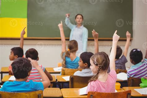 Teacher Asking A Question To Her Class 1242892 Stock Photo At Vecteezy