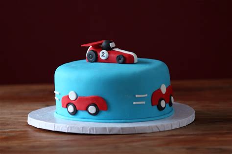 Bust out the bow ties and give everyone top hats to wear! Racing car themed birthday cake for a 2 year old little ...