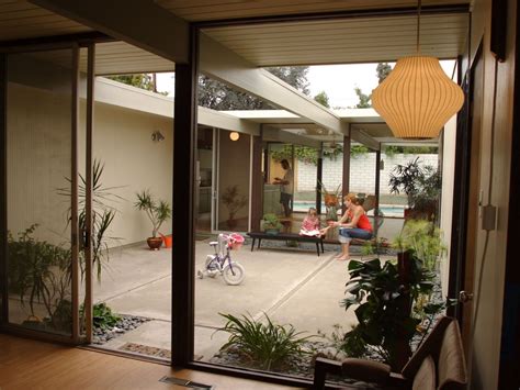 Courtyards middle perfect could tweaked. Atomic Ranch Interior. Love these wall sized windows and ...