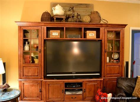 So to decorate your entertainment center shelves, these things are needed to be. How I Gave My Entertainment Center A Makeover {Without Paint!} - Worthing Court