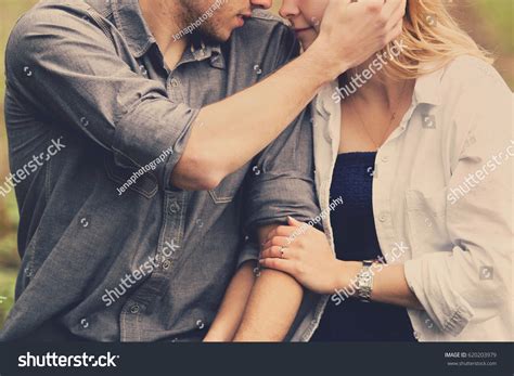 Man Touching Womans Face Affectionately Foto De Stock