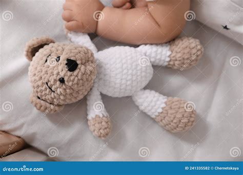 Adorable Little Baby With Toy Bear In Bed Closeup Stock Photo Image
