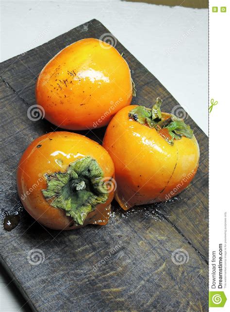 Persimmon On The Board Stock Image Image Of Farm Background 81486667