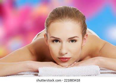 Beautiful Caucasian Naked Woman Lying On Stock Photo