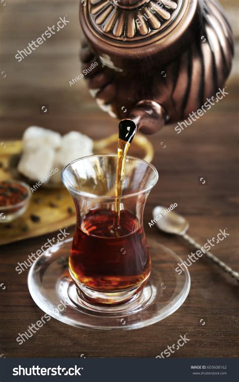 Poring Turkish Tea Into Traditional Glass Stock Photo 603608162