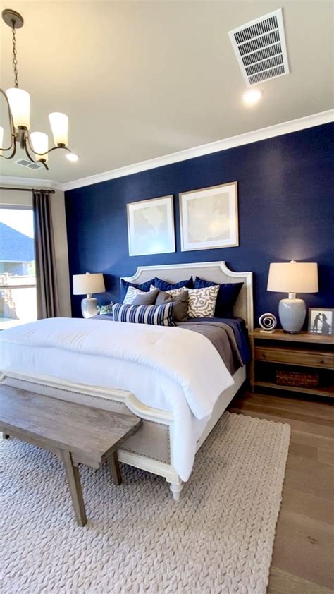 Master Bedroom Design With Royal Blue Accent Wall Behind The Bed Click