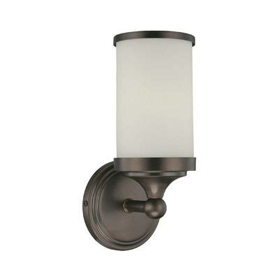 As a company, we pride ourselves on the quality and workmanship of each and every fixture we produce. Minka Lavery Wall Sconce with Etched White Glass in Dark ...