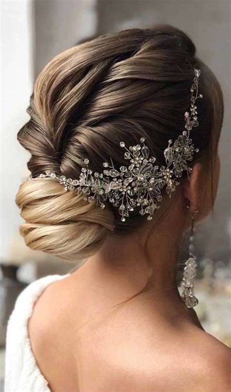 50 cute wedding hairstyles for every bride 34 rustic wedding centerpieces that'll elevate your reception 52 updo hairstyles for a wedding that will stay put Bridal hairstyles that perfect for ceremony and reception 27