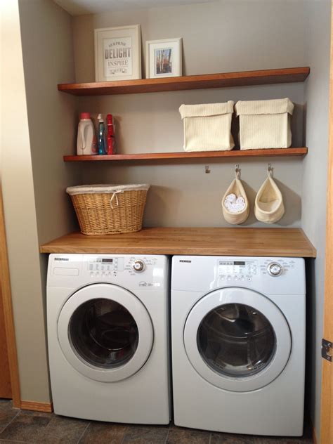 Find smart ways to add more storage space. Laundry room floating shelves made from oak doors (stained ...