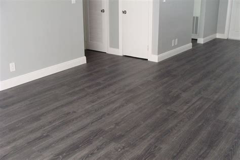Dark Hardwood Color Floor With Grey Walls In 2020 Grey Flooring