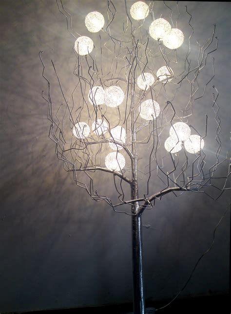 A large and bold floor lamp of a tree branch, a stylish stone base and a fabric lampshade for a natural touch. Floor tree lamp - 10 lamps covering any type of lighting ...