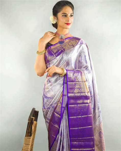 Kanchi Pattu Saree With Purple And Gold Border