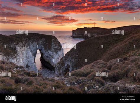 Dramatic Sunrise Over The Chalk Arch At Selwick Bay Flamborough Head