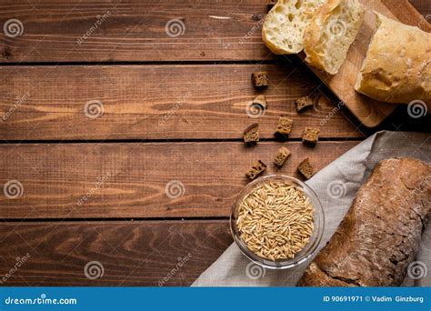 Dried Crumbs With Bread On Kitchen Table Background Top View Mokeup