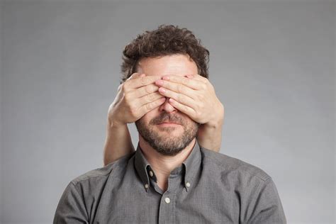 Cropped Image Of Hand Covering Man Eyes Against White Background Techcrunch