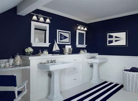 Choose dark wood to highlight the white and complement the navy blue. Delorme Designs | Blue bathroom decor, Nautical bathroom ...