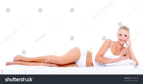 Sexy Happy Woman With Perfect Beautiful Shape Of Body Lying On Bed