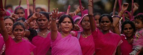 Gulabi Gang Women In Pink Saris Wielding Bamboo Sticks In Pursuit Of
