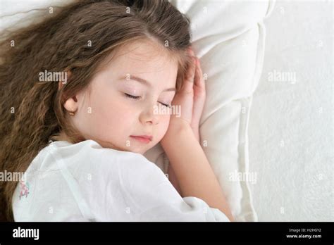 Cute Little Girl Sleeping Stock Photo Alamy