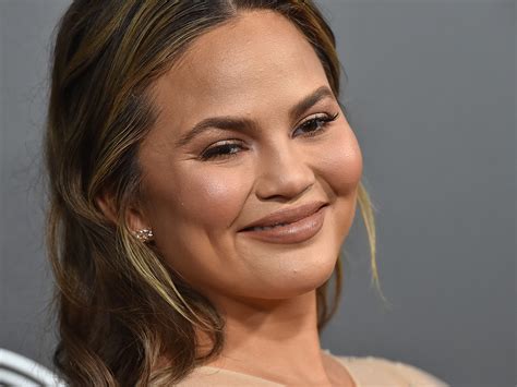 chrissy teigen is one of the rare celebs embracing her grey hair
