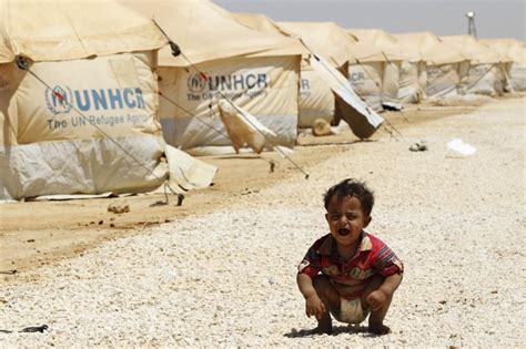 A Syrian Refugee Child Cries At The Al Zaatri Refugee Camp