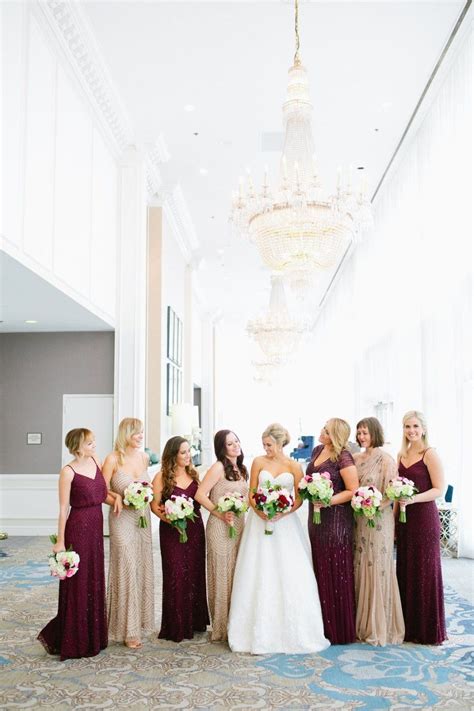 Mix And Matched Bridesmaids Dresses In Crimson And Gold Grooms Attire