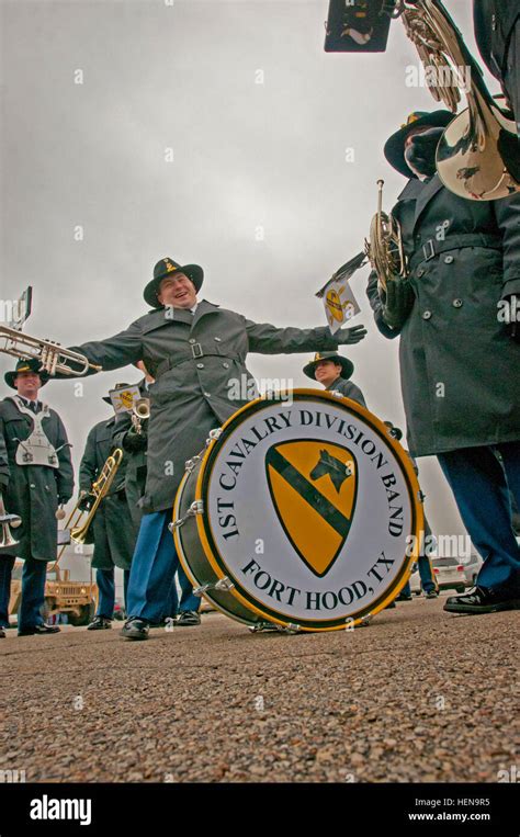 Members Of The 1st Cavalry Division Band Try To Stay Warm Before The