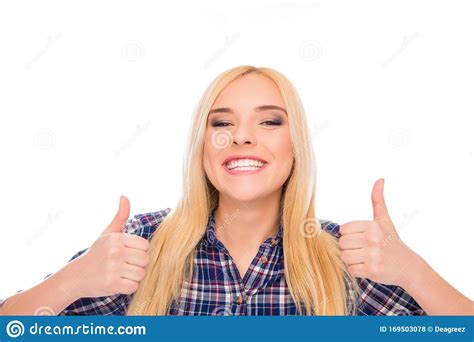 Happy Successful Girl With Beaming Smile Showing Thumbs Up Stock Photo