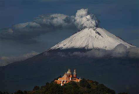 The smoking peak of the volcano Popocatepetl in the sun ... Most mountain tattoos are inspired from real mountain ranges such as.