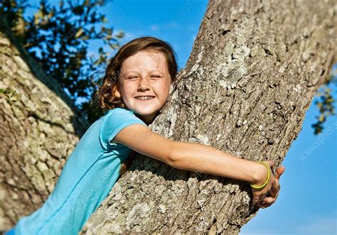 Girl Climbing Tree Stock Image C0299443 Science Photo Library