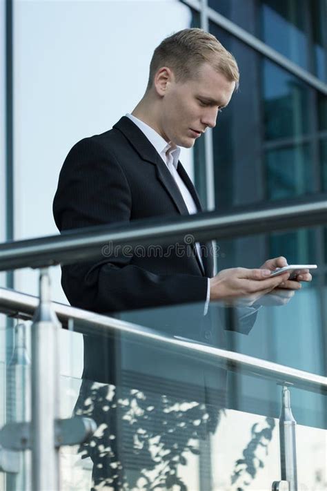 Businessman Using Phone Outside The Building Stock Image Image Of