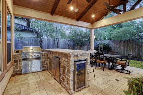 Outdoor kitchen roof ideas can be divided in three types, the uncovered roof, covered roof, and pergolas roof. Memorial Area Outdoor Living Space - Texas Custom Patios