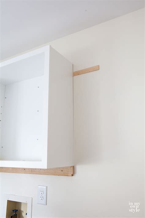 Certain objects and certain weights require certain supports and fasteners for a secure whether you're hanging a kitchen cabinet or a coat hook, your best option is to attach things to a stud. Mudroom Update: Installing Wall Cabinets | In My Own Style