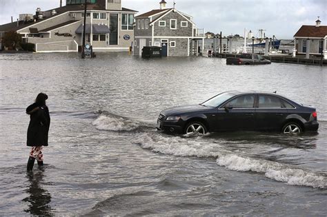 Heavy rains bring flooding to coastal and river areas in New England