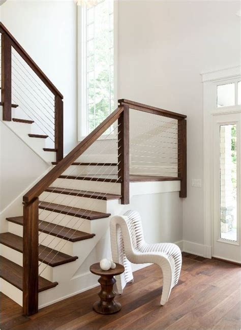 Dark Wood And Cable Railing With White Steps Look Chic And Modern