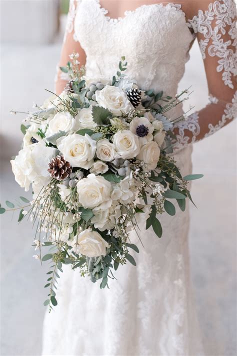 Wintery White Rose Pine Cone And Silver Brunia Bouquet Winter