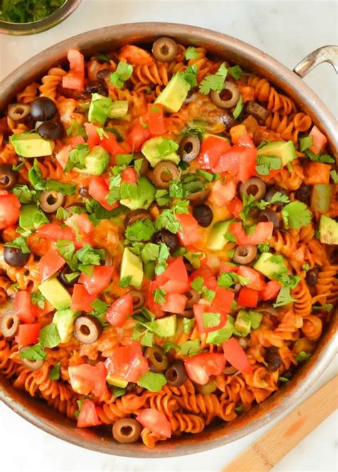 Simmer rapidly, stirring to scrape the brown. Chicken Enchilada Pasta Skillet | Serena Bakes Simply From ...
