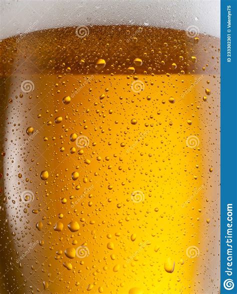 Cooled Glass Of Beer Close Up Small Water Drops On Cold Surface Of