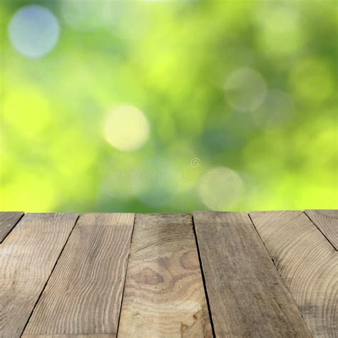 Wood Table Top On Green Blurry Backgrounds Stock Photo Image Of