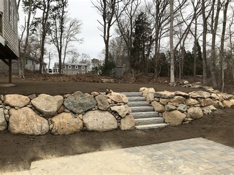 Natural Rock Retaining Wall Installation In Falmouth Ma