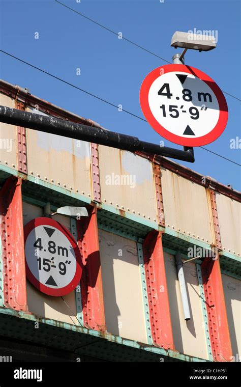 Uk Height Limit Signs On A Rail Bridge In London Stock Photo Alamy