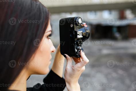 Beautiful Female Photographer Posing With Camera 11528864 Stock Photo