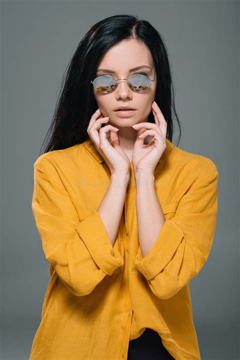Attractive Brunette Model Posing In Yellow Blouse And Sunglasses Stock Photo Image Of Sensual