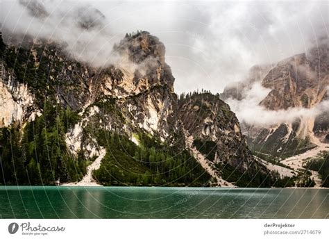 Braies Lake With Clouds In The Dolomites Iv A Royalty Free Stock