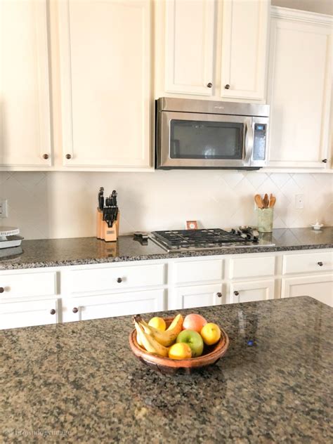 That way they don't clash with each other, says toh design correspondent carole freehauf. Painting Tile Backsplash - See How It Looks A Year Later